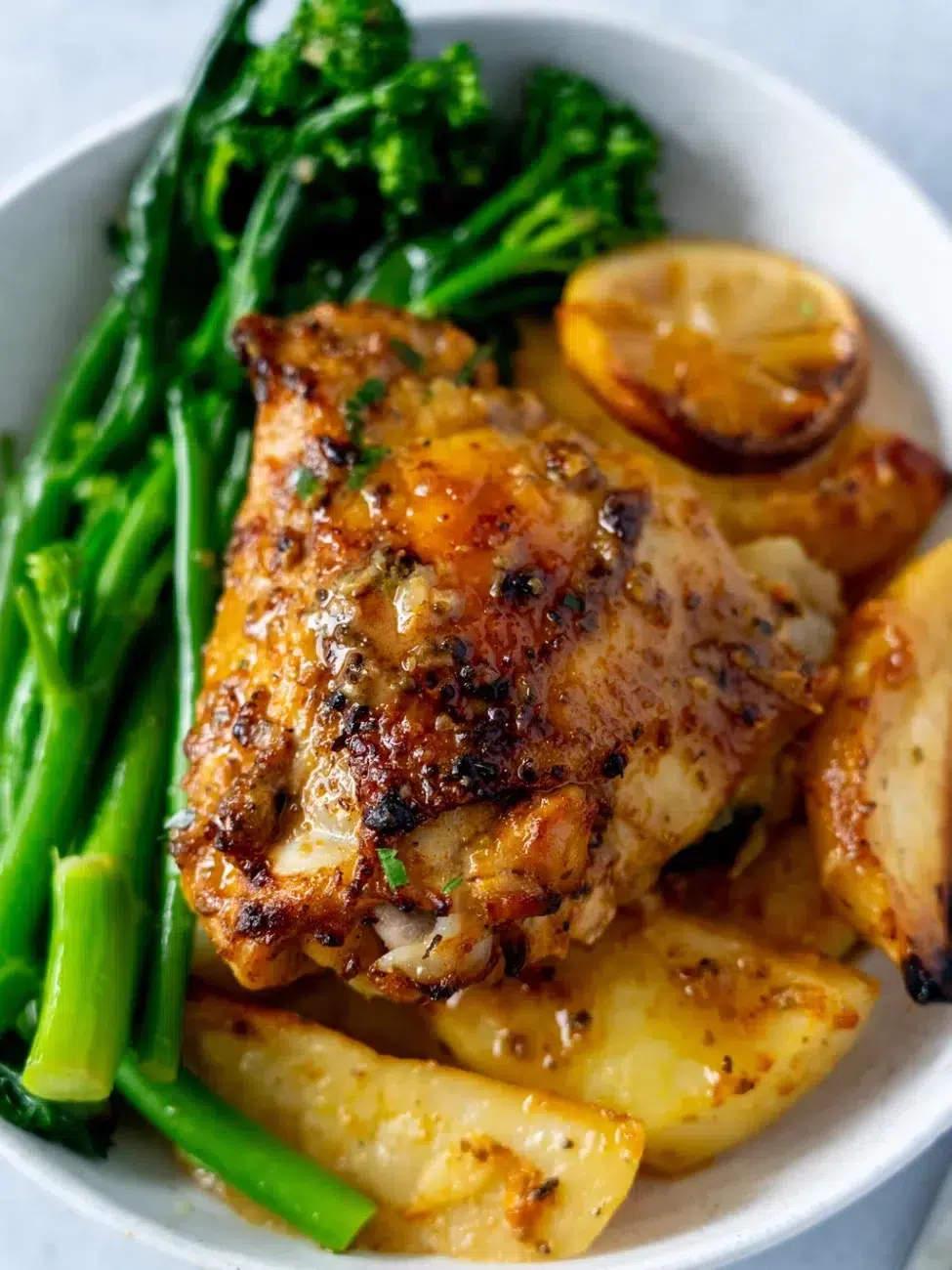 Plated one pan lemon garlic chicken and potatoes recipe
